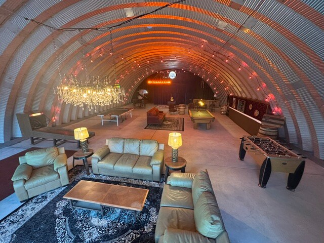 Lounge seating inside The Vortex Quonset hut