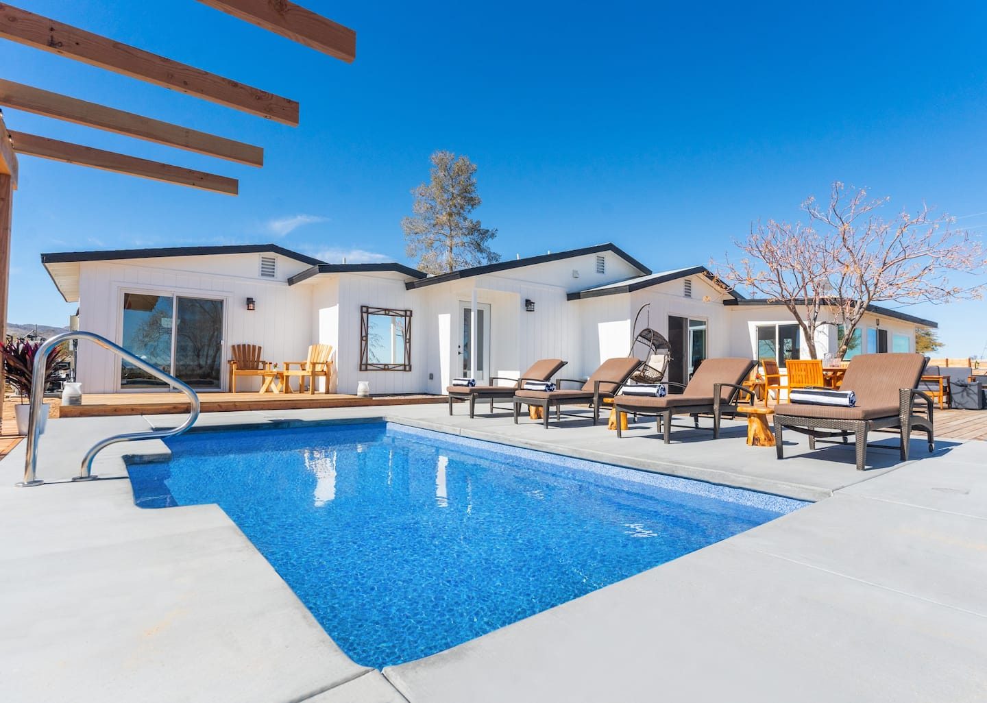 Saltwater pool and sundeck on a sunny day
